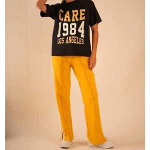 NEW CARE TUCKER marlie care 1984 short sleeve tee in black